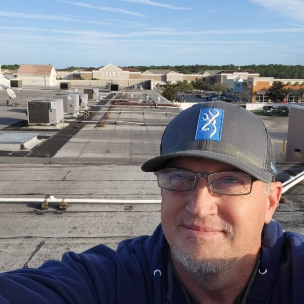 Business owner overseeing HVAC project