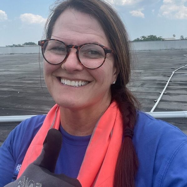 Rooftop HVAC service team member